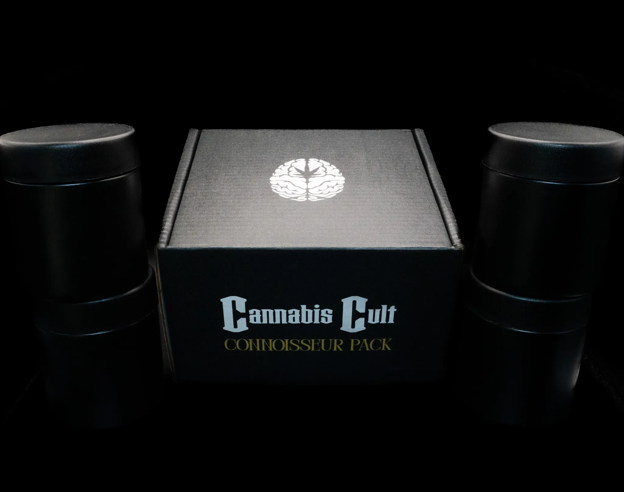 Cannabis Cult Connoisseur Pack box with white brain logo and four black cannabis flower containers displayed on a black background.